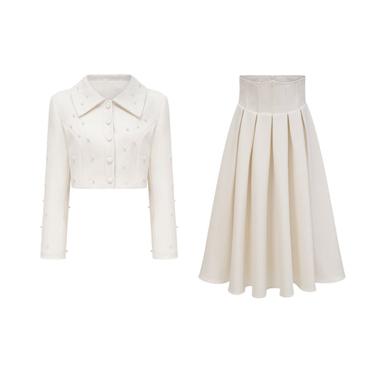 Conjunto de chaqueta y falda plisada