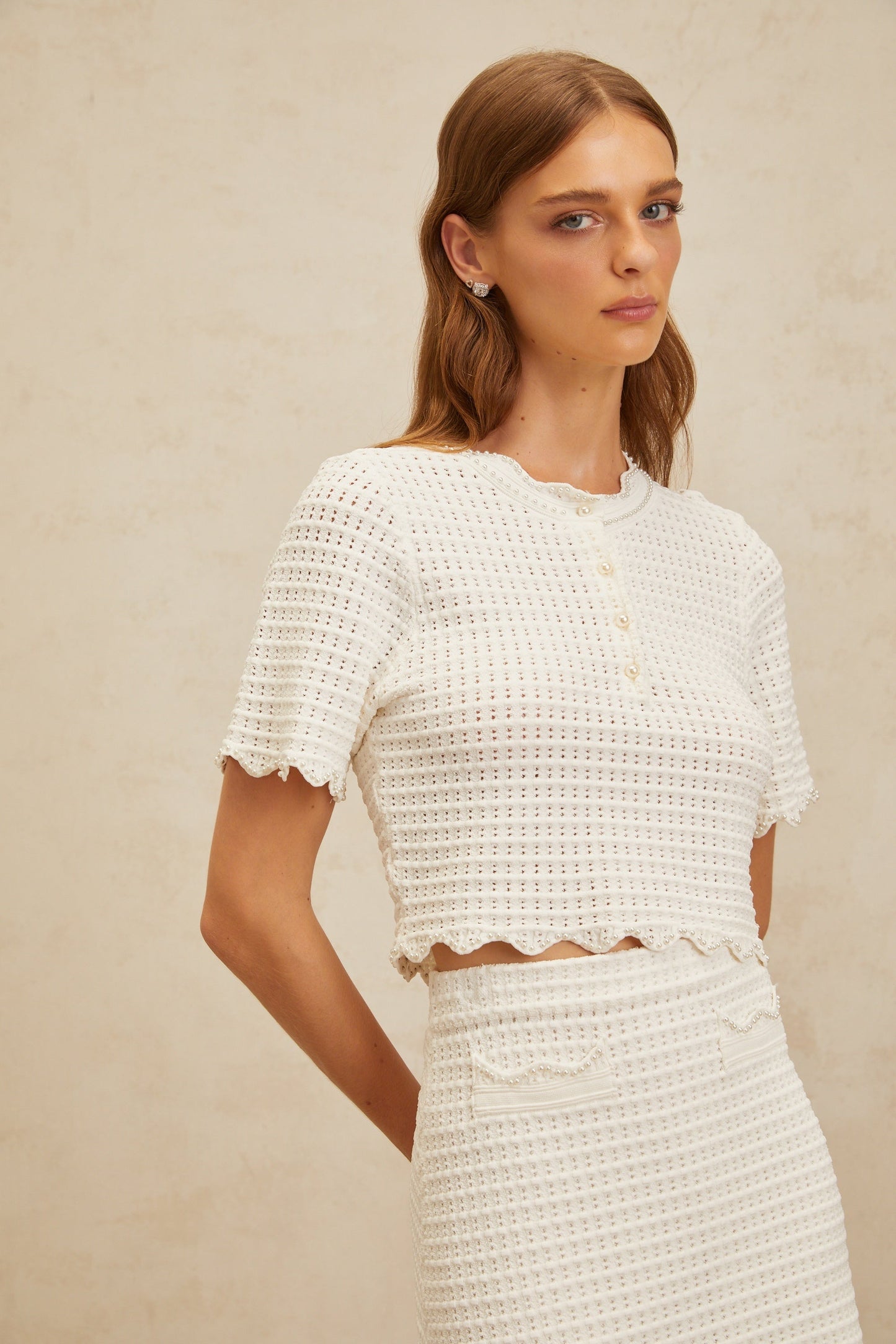 Top y falda de punto calado con volantes