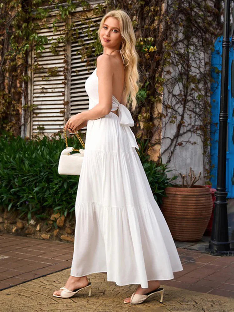 Vestido largo con volantes y cuello halter