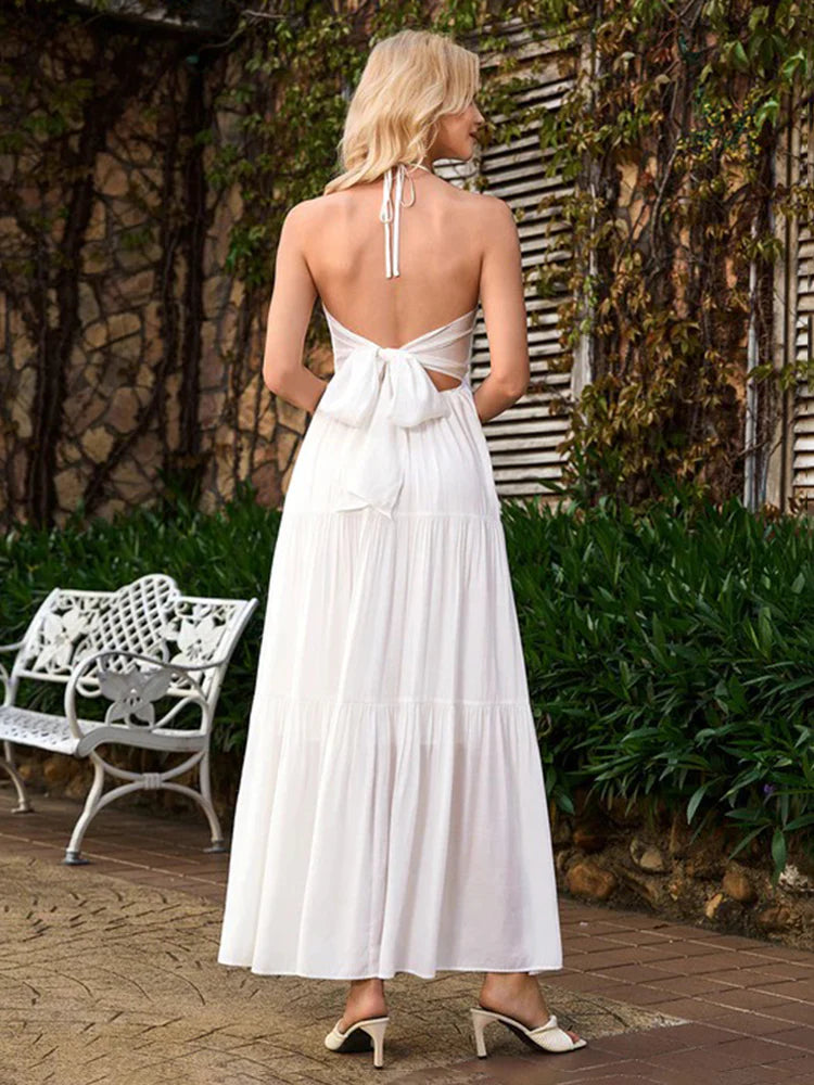 Vestido largo con volantes y cuello halter