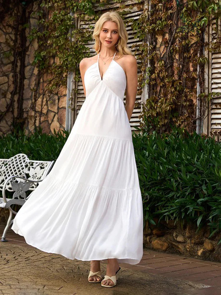 Vestido largo con volantes y cuello halter