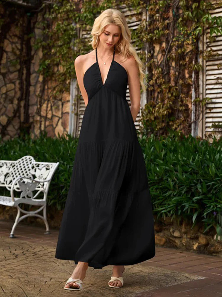 Vestido largo con volantes y cuello halter
