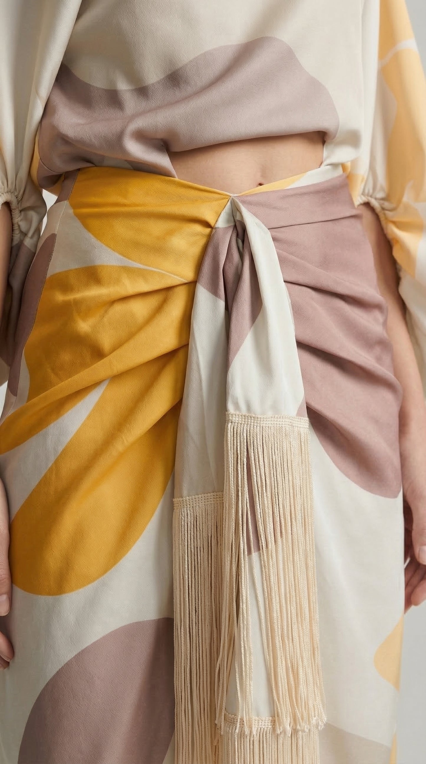 Conjunto dos piezas con flecos