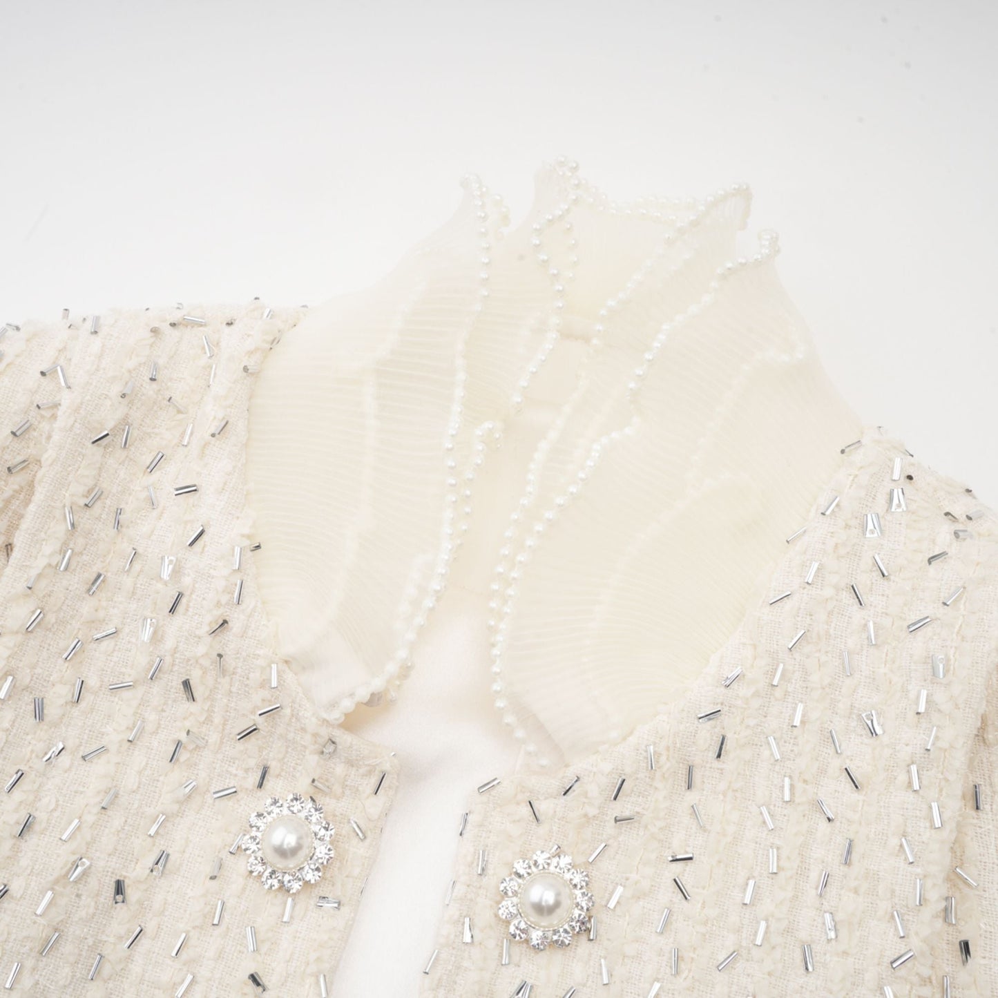 Chaqueta corta con volantes