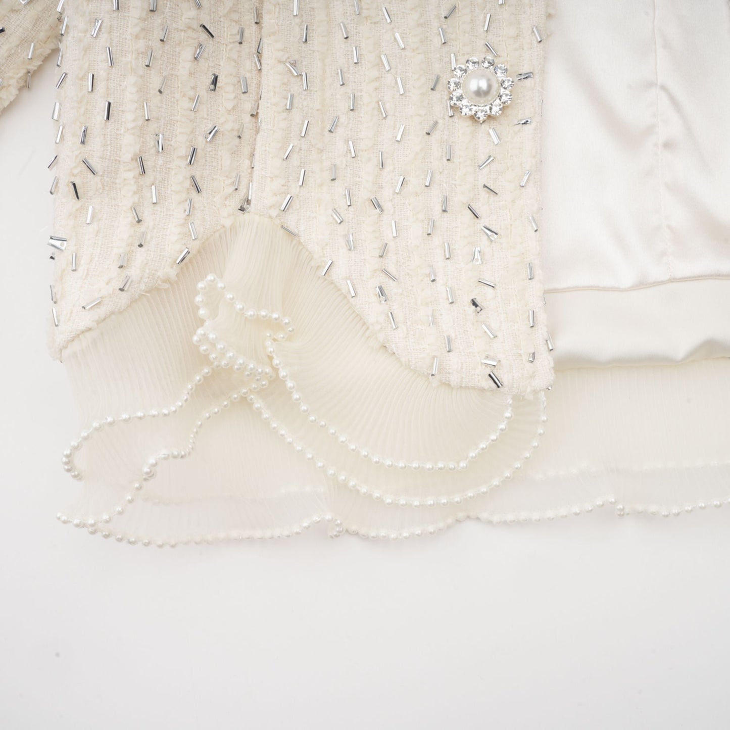 Chaqueta corta con volantes