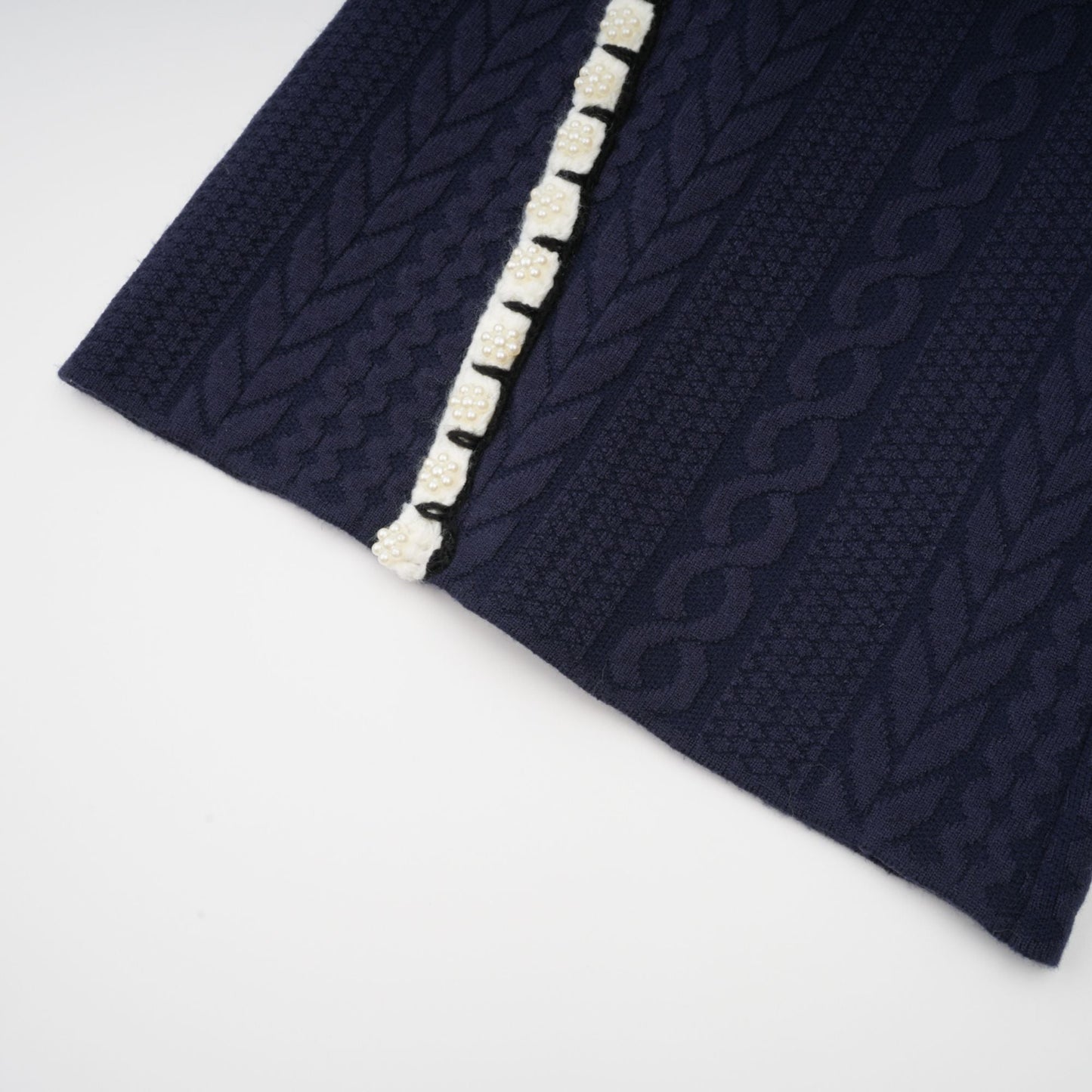 Chaqueta de punto azul marino y pantalones