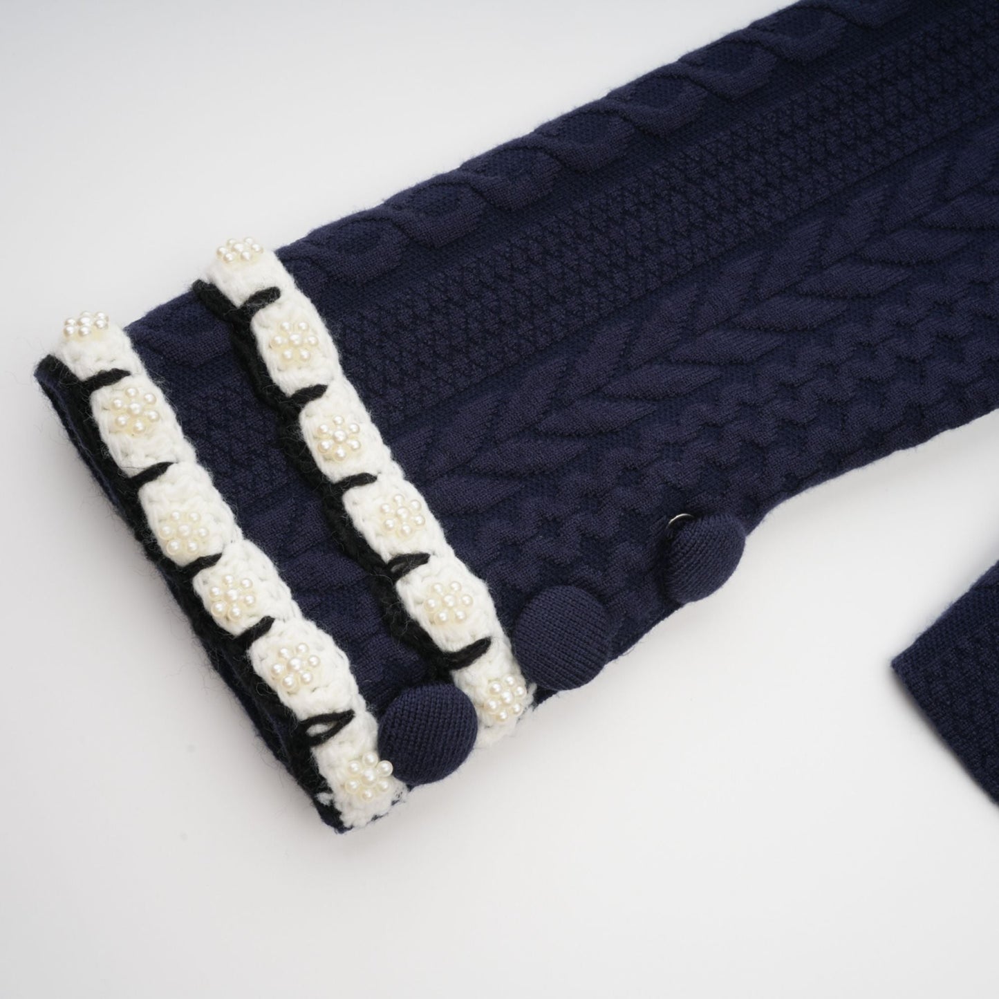 Chaqueta de punto azul marino y pantalones