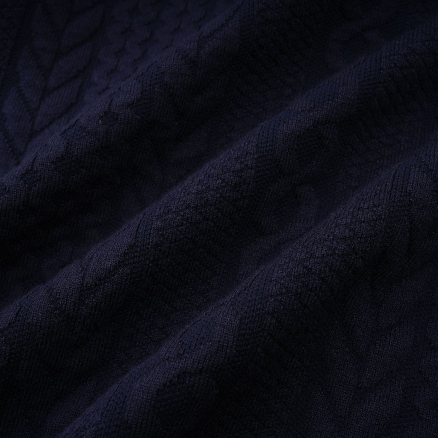 Chaqueta de punto azul marino y pantalones