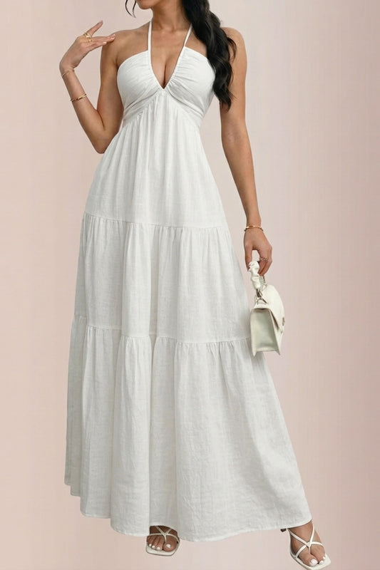 Vestido largo con volantes y cuello halter