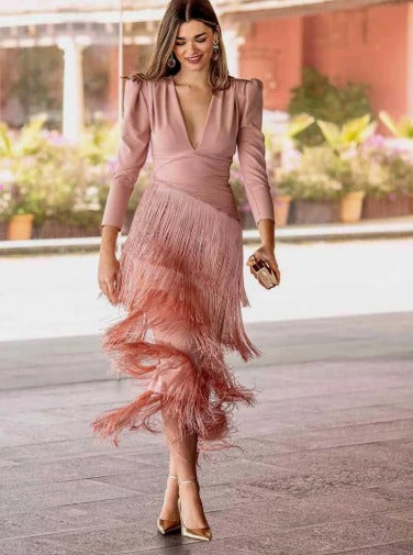 Vestido con mangas de flecos