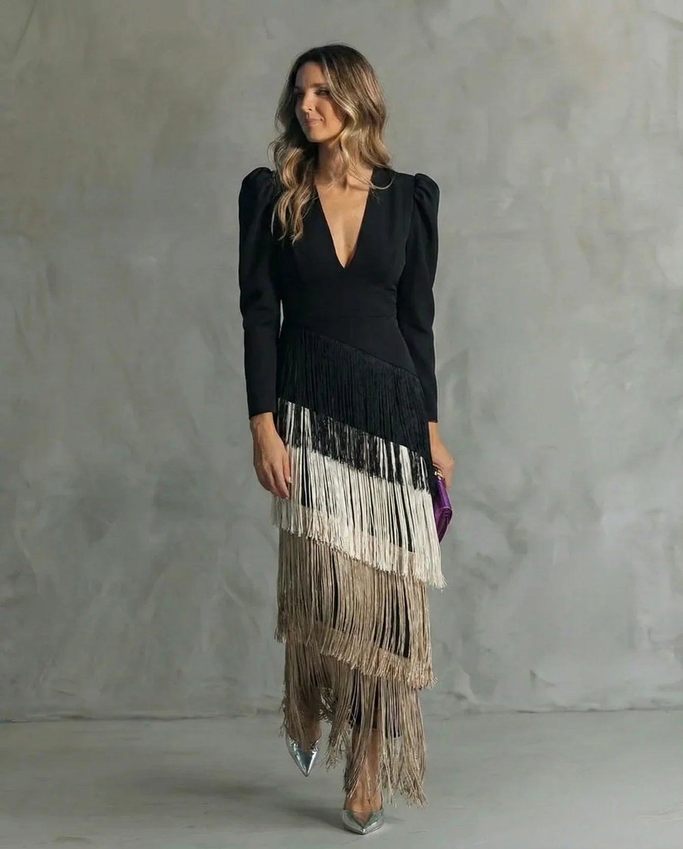 Vestido con mangas de flecos