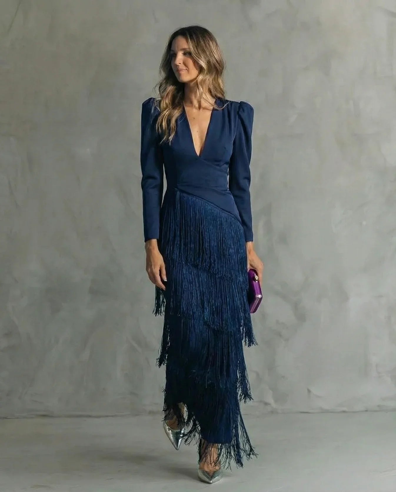 Vestido con mangas de flecos