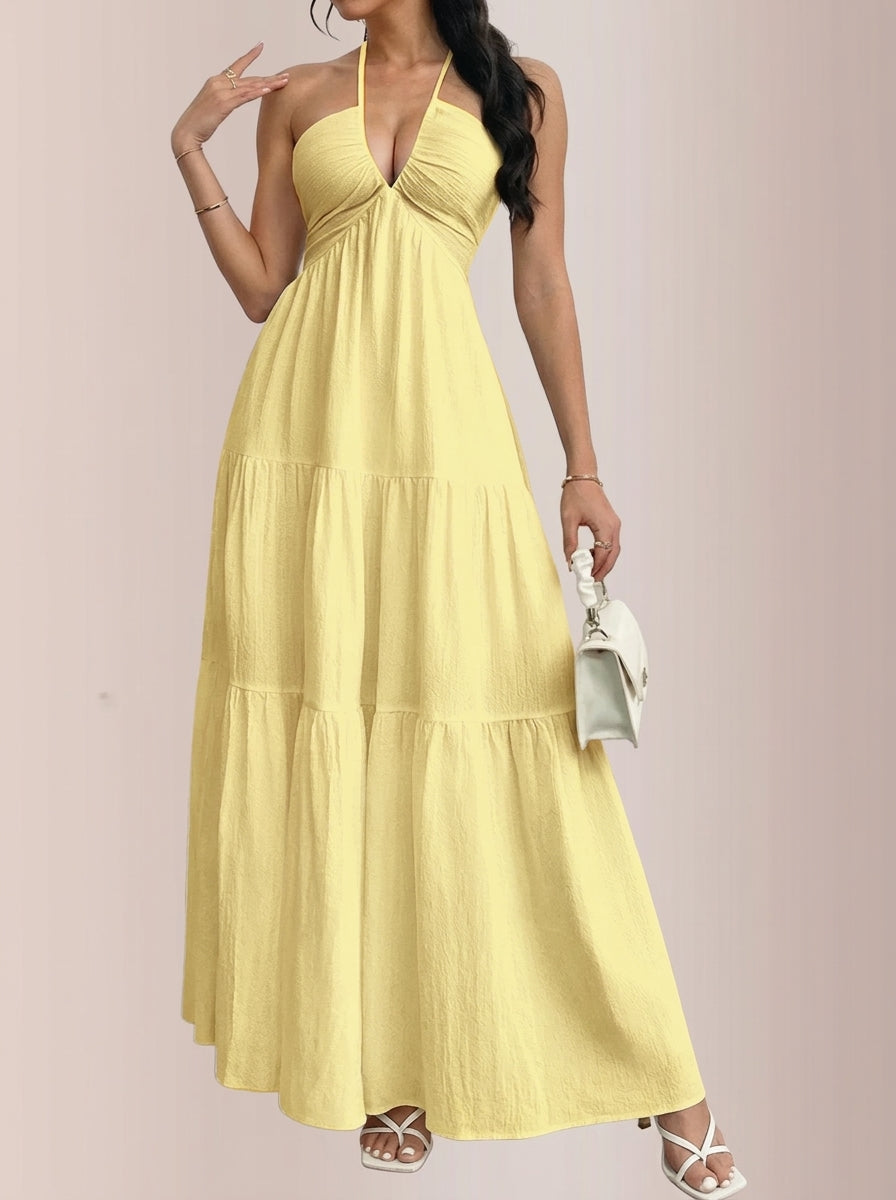 Vestido largo con volantes y cuello halter